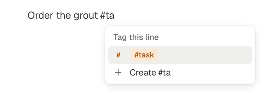 A line reading “Order the grout #ta” with the Tag this line menu under it: #task, and Create #ta